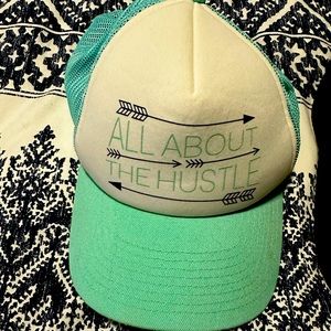 All about the hustle trucker hat